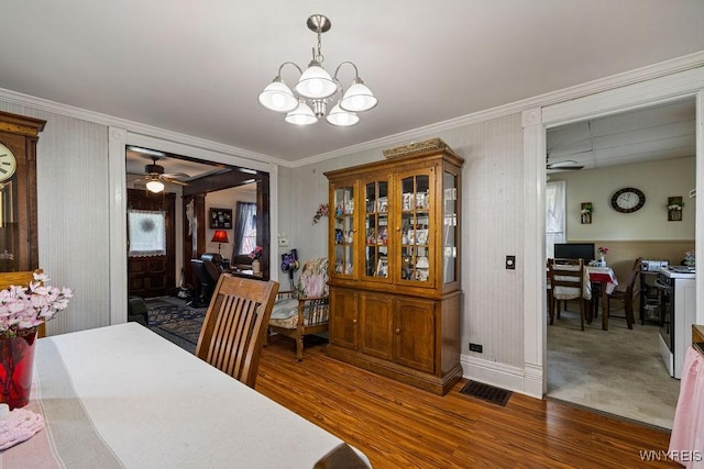 19 Reed St, Lockport City, NY 14094 - dining space with ceiling fan, an office area, crown molding, wood finished floors, and a chandelier