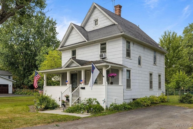 19 Reed St, Lockport City, NY 14094 - traditional style home featuring a shingled roof, a chimney, a porch, and cooling unit
