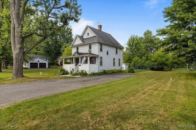 19 Reed St, Lockport City, NY 14094 - view of front of home with a chimney and an outdoor structure