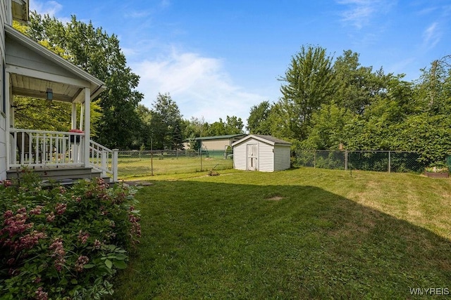 19 Reed St, Lockport City, NY 14094 - fenced backyard with a storage shed and view of wooded area