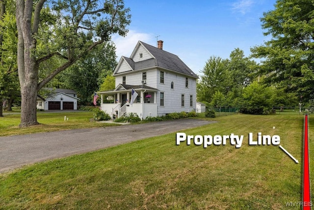 19 Reed St, Lockport City, NY 14094 - view of front of home featuring a chimney and an outdoor structure