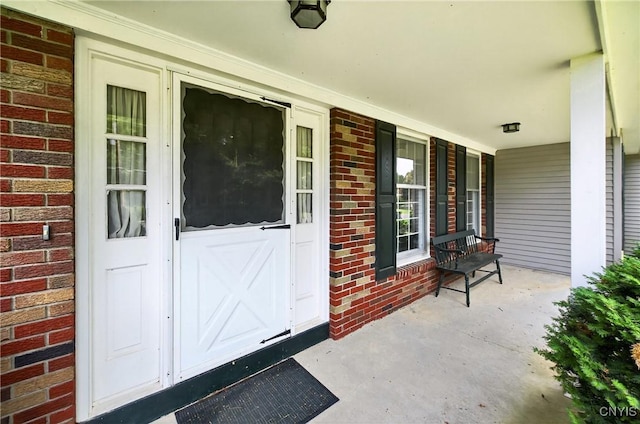7569 Northfield Ln, Manlius, NY 13104 - entrance to property featuring brick siding and covered porch