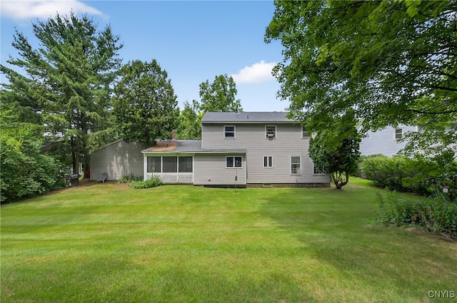 7569 Northfield Ln, Manlius, NY 13104 - back of property with a yard and a sunroom
