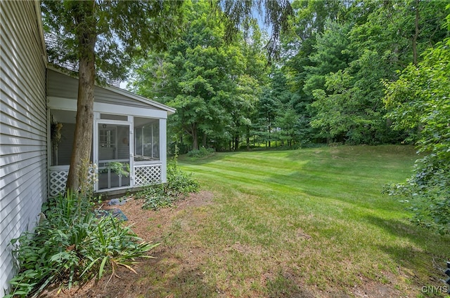 7569 Northfield Ln, Manlius, NY 13104 - view of grassy yard featuring a sunroom