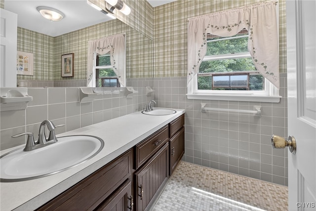 7569 Northfield Ln, Manlius, NY 13104 - full bath with tile walls, double vanity, and tile patterned flooring