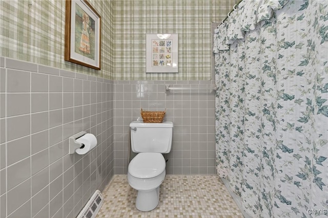 7569 Northfield Ln, Manlius, NY 13104 - bathroom featuring tile walls, wallpapered walls, and a shower with curtain