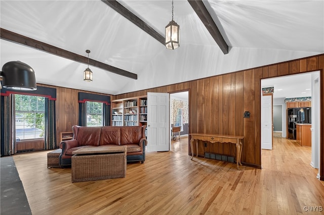 7569 Northfield Ln, Manlius, NY 13104 - living room featuring wooden walls and light wood-style floors