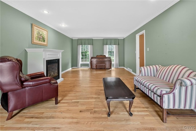 7569 Northfield Ln, Manlius, NY 13104 - living room featuring ornamental molding, light wood-style floors, a fireplace, and recessed lighting