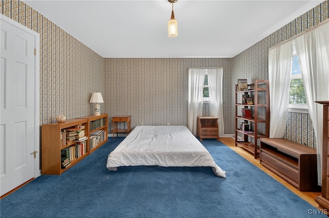 7569 Northfield Ln, Manlius, NY 13104 - bedroom featuring wallpapered walls and multiple windows