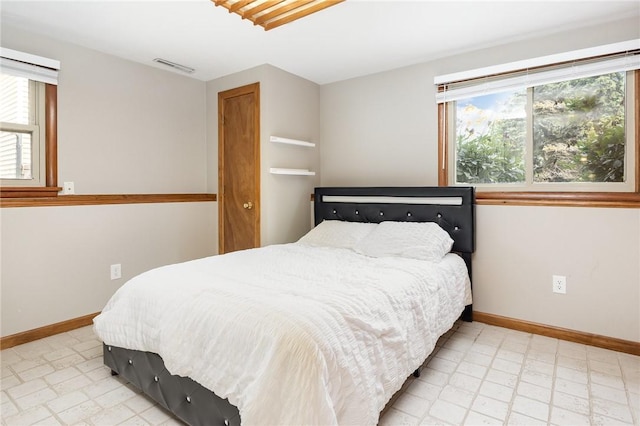 17 Francine Dr, Gates, NY 14606 - bedroom with baseboards and light floors