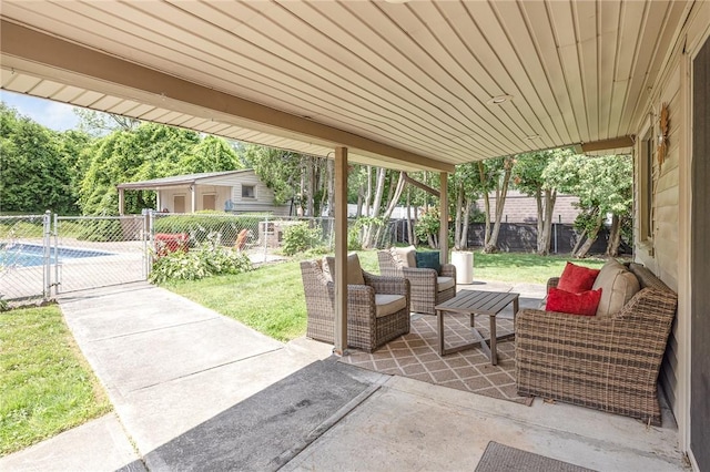 17 Francine Dr, Gates, NY 14606 - fenced backyard featuring an outdoor hangout area and a patio