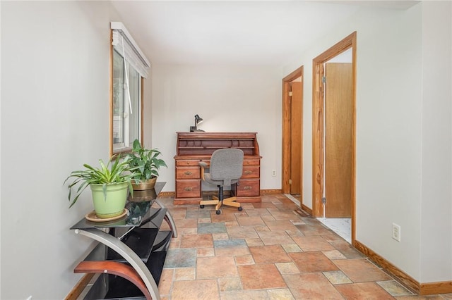 17 Francine Dr, Gates, NY 14606 - home office featuring baseboards and light stone finish floors