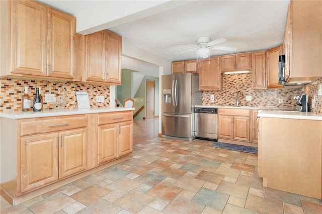 17 Francine Dr, Gates, NY 14606 - kitchen featuring stainless steel appliances, a ceiling fan, decorative backsplash, and light countertops