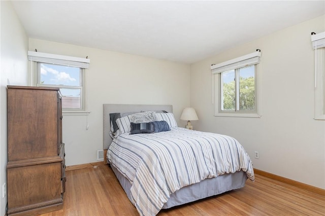 17 Francine Dr, Gates, NY 14606 - bedroom with light wood-type flooring and baseboards