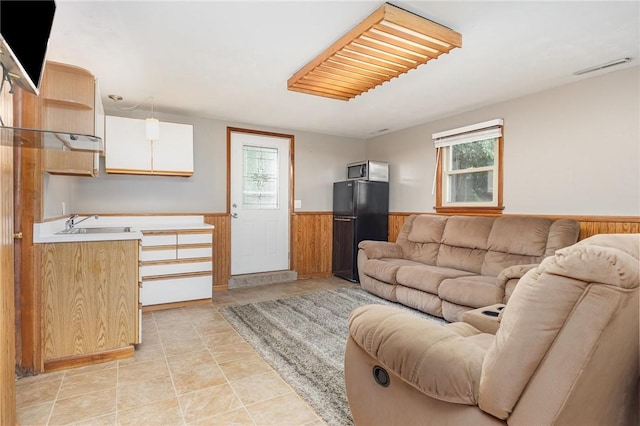 17 Francine Dr, Gates, NY 14606 - living area with wainscoting and wood walls