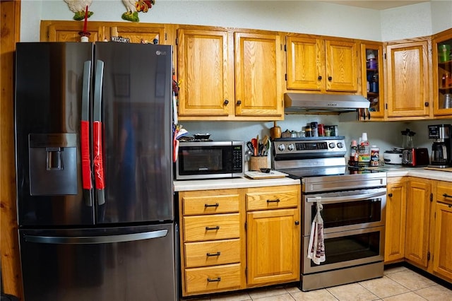 3 Willow Dr, Erwin, NY 14870 - kitchen with appliances with stainless steel finishes, under cabinet range hood, light countertops, and brown cabinetry