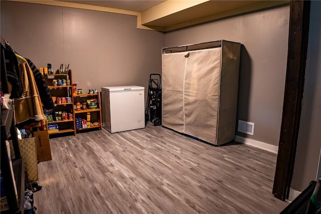 3 Willow Dr, Erwin, NY 14870 - finished basement featuring refrigerator and wood finished floors