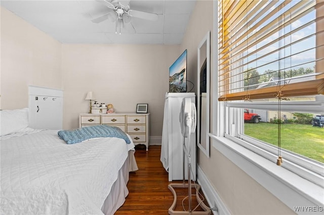 2469 Seneca St, West Seneca, NY 14210 - bedroom with dark wood finished floors, multiple windows, and a ceiling fan