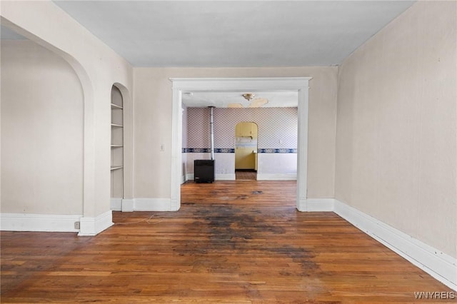 2469 Seneca St, West Seneca, NY 14210 - hallway featuring wood finished floors and built in shelves