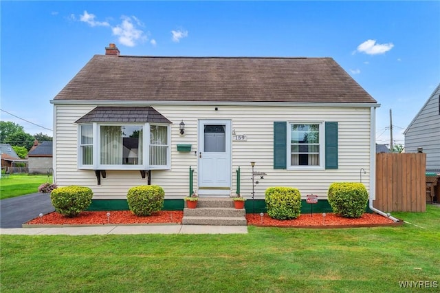159 Beale Ave, Cheektowaga, NY 14225 - new england style home featuring roof with shingles and a chimney