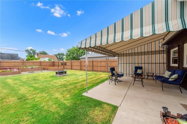 159 Beale Ave, Cheektowaga, NY 14225 - fenced backyard with a patio and a fire pit
