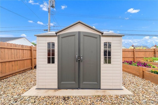 159 Beale Ave, Cheektowaga, NY 14225 - view of shed with a vegetable garden and a fenced backyard