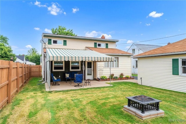 159 Beale Ave, Cheektowaga, NY 14225 - rear view of house featuring an outdoor fire pit, a fenced backyard, a patio area, and a chimney