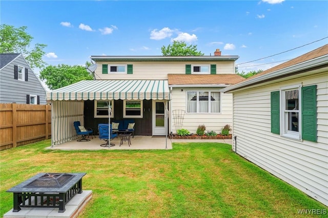 159 Beale Ave, Cheektowaga, NY 14225 - back of property with an outdoor fire pit and a patio area