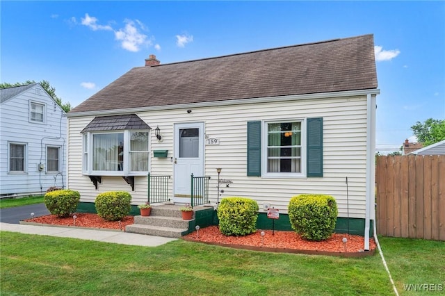 159 Beale Ave, Cheektowaga, NY 14225 - new england style home featuring a chimney and a shingled roof
