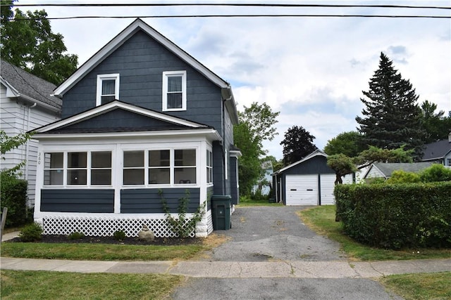360 Ellison St, Rochester, NY 14609 - view of front of house featuring an outbuilding and a garage