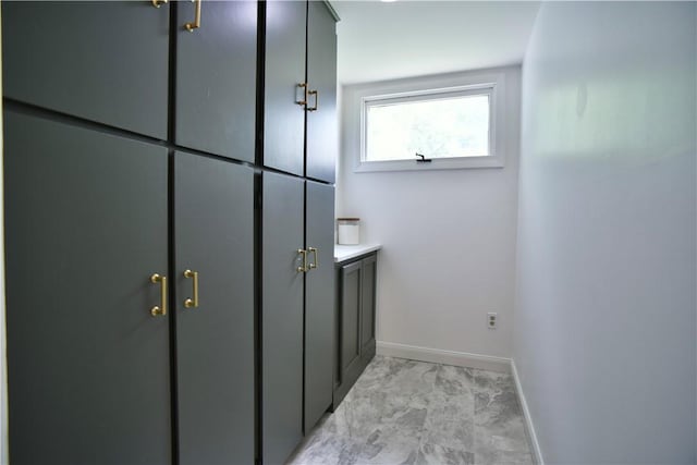360 Ellison St, Rochester, NY 14609 - bathroom featuring marble finish floors and baseboards
