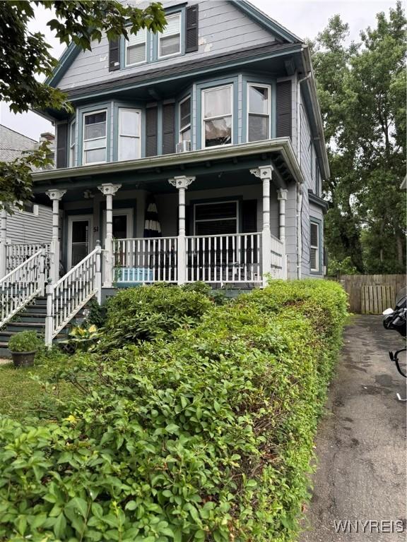 51 Ashton Pl, Buffalo, NY 14220 - view of front facade with a porch