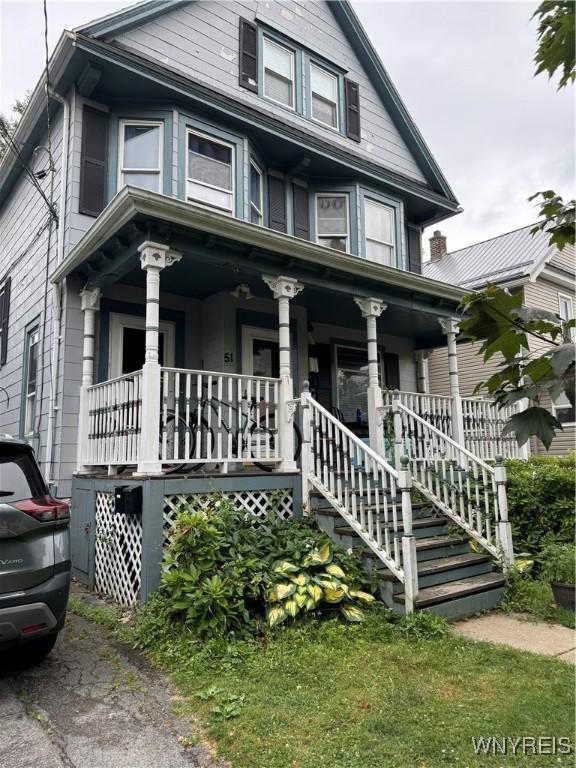 51 Ashton Pl, Buffalo, NY 14220 - view of front facade featuring a porch and stairs