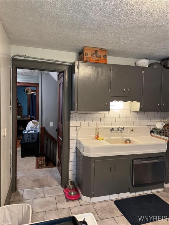 51 Ashton Pl, Buffalo, NY 14220 - bathroom with a textured ceiling, tile patterned flooring, tasteful backsplash, and vanity