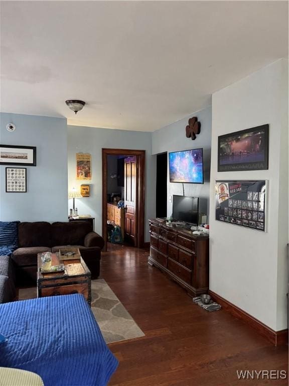 51 Ashton Pl, Buffalo, NY 14220 - living room with dark wood-type flooring and baseboards