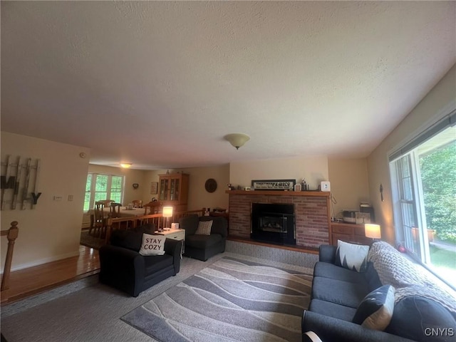 20 Pond Path, Oswego, NY 13126 - living area with a textured ceiling and a brick fireplace
