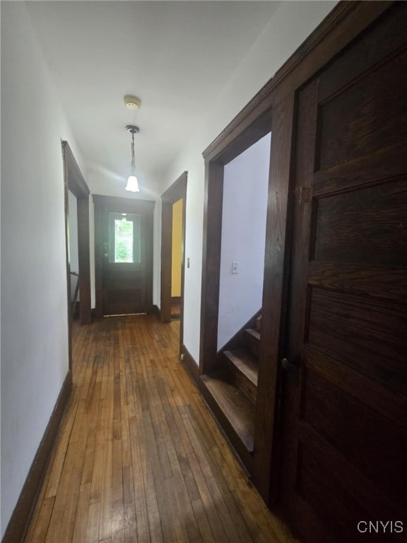 826 Lancaster Ave, Syracuse, NY 13210 - hallway with wood-type flooring and stairway
