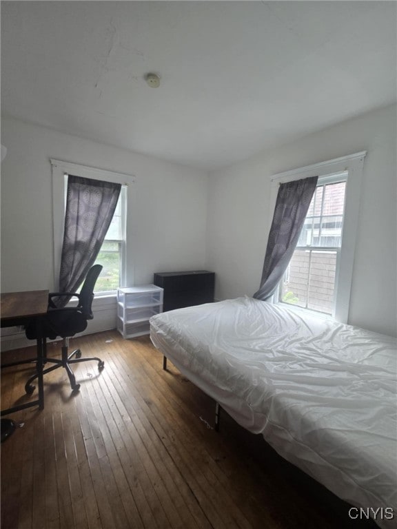 826 Lancaster Ave, Syracuse, NY 13210 - bedroom with hardwood / wood-style flooring and a desk