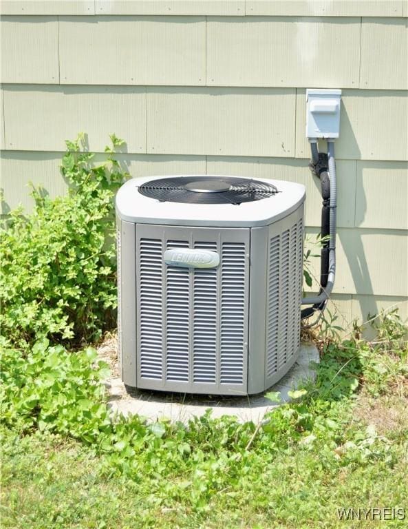 77 Harlem Rd, West Seneca, NY 14224 - exterior view of a central air condition unit
