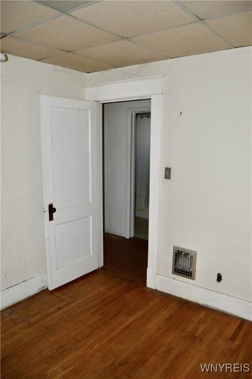 77 Harlem Rd, West Seneca, NY 14224 - unfurnished room featuring wood finished floors and a paneled ceiling