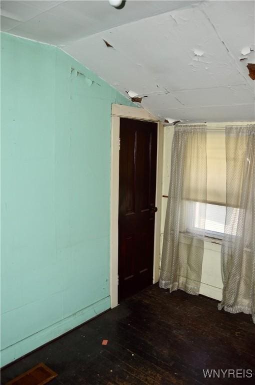 77 Harlem Rd, West Seneca, NY 14224 - empty room featuring wood-type flooring and lofted ceiling