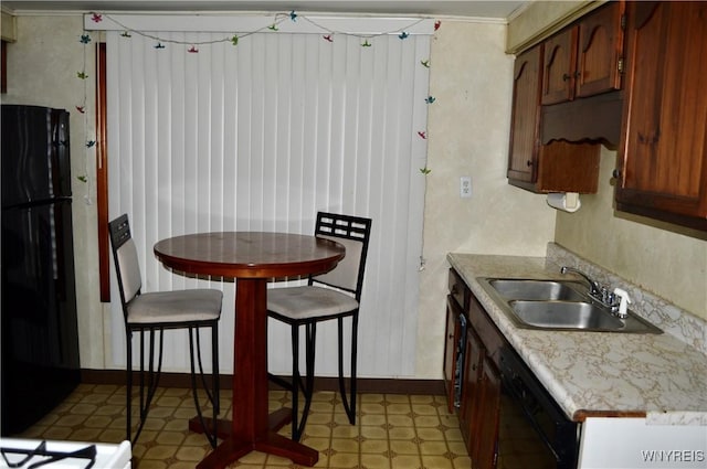 77 Harlem Rd, West Seneca, NY 14224 - kitchen with black appliances, light floors, and light countertops