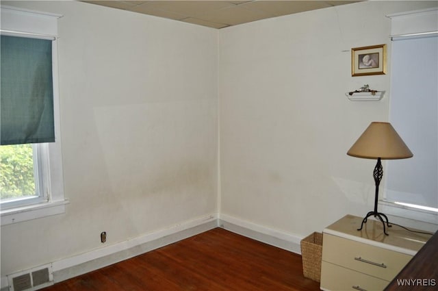 77 Harlem Rd, West Seneca, NY 14224 - spare room with dark wood finished floors and baseboards
