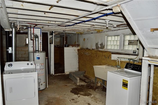 77 Harlem Rd, West Seneca, NY 14224 - below grade area featuring gas water heater and independent washer and dryer