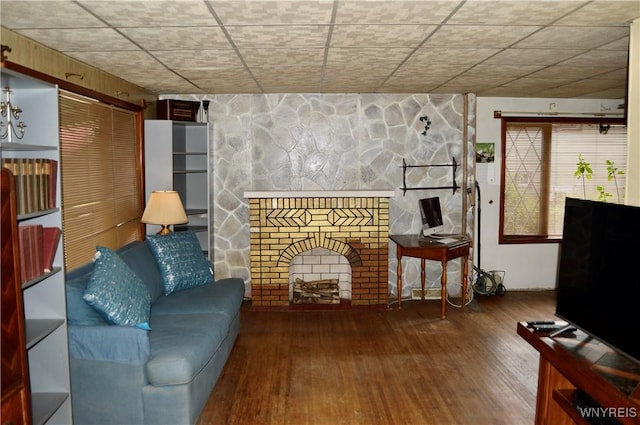 77 Harlem Rd, West Seneca, NY 14224 - living area featuring hardwood / wood-style floors and a large fireplace