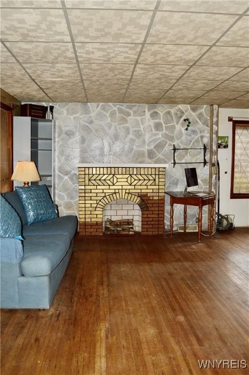 77 Harlem Rd, West Seneca, NY 14224 - living room with a stone fireplace and wood finished floors