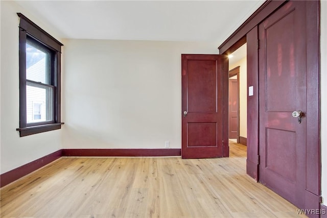 153 Hinman Ave, Buffalo, NY 14216 - empty room featuring baseboards and light wood-style floors