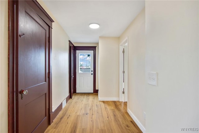 153 Hinman Ave, Buffalo, NY 14216 - corridor featuring baseboards and light wood finished floors