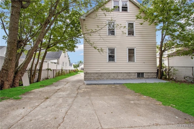 153 Hinman Ave, Buffalo, NY 14216 - view of property exterior with a patio and concrete driveway