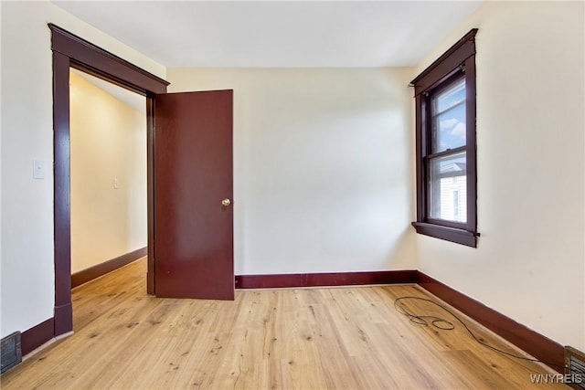 153 Hinman Ave, Buffalo, NY 14216 - unfurnished room with baseboards and wood finished floors